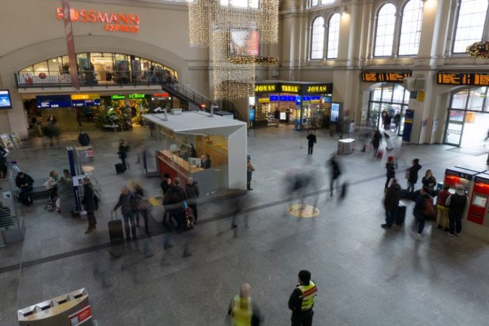 Image of the Peoples walking inside the train station, Metro Surveillance Security